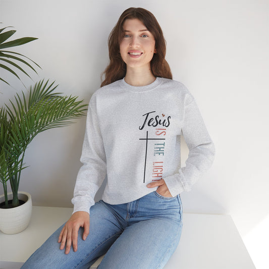 He Is The Light Women's Heavy Blend™ Crewneck Christian Sweatshirt