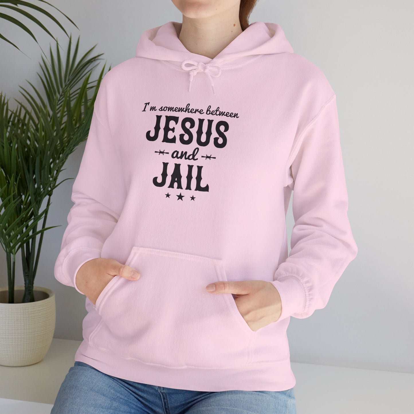 I'm Somewhere Between Jesus And Jail Funny Unisex Christian Hooded Pullover Sweatshirt