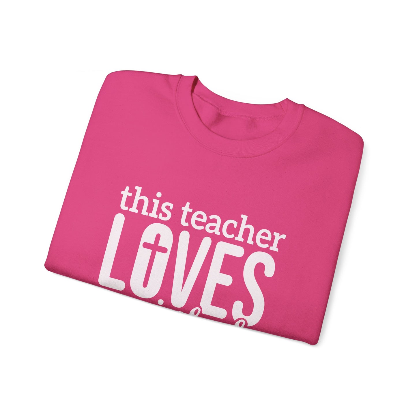 This Teacher Loves Jesus Unisex Heavy Blend™ Crewneck Christian Sweatshirt