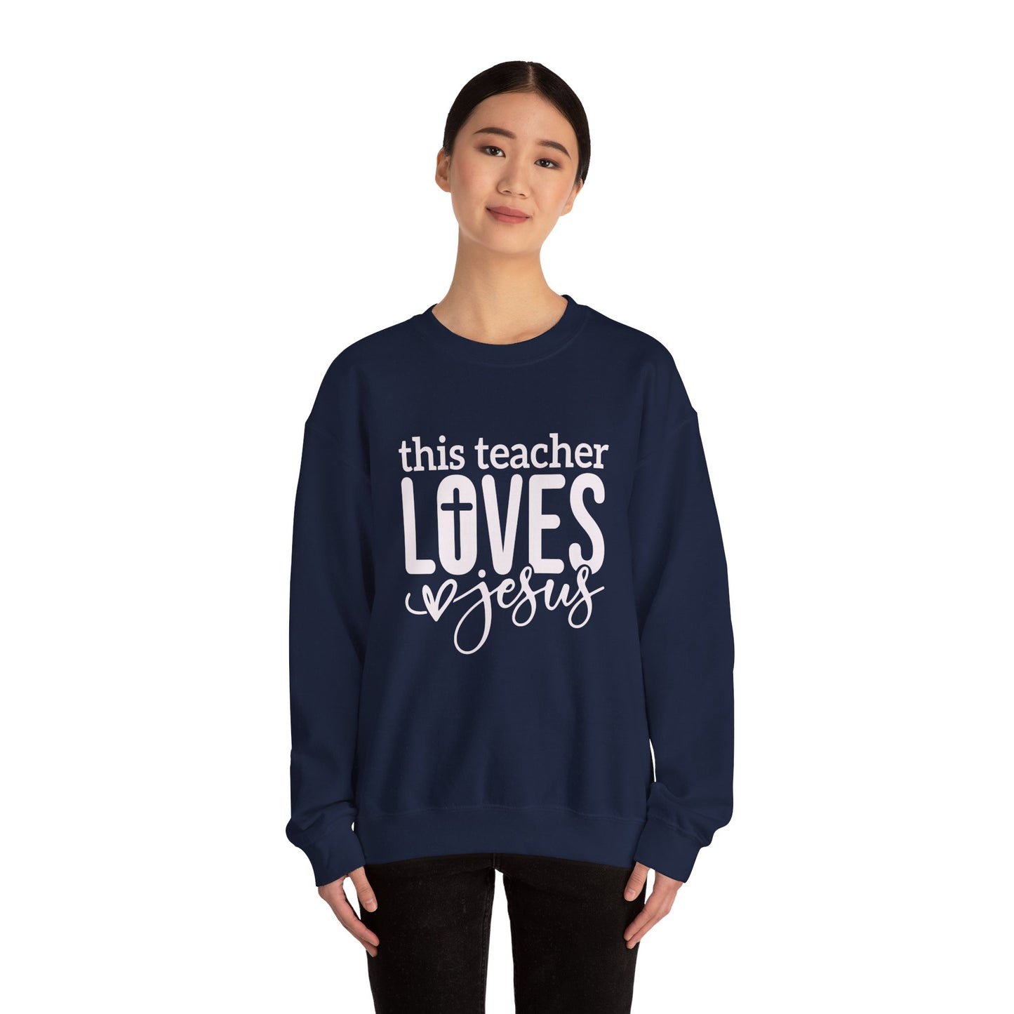 This Teacher Loves Jesus Unisex Heavy Blend™ Crewneck Christian Sweatshirt