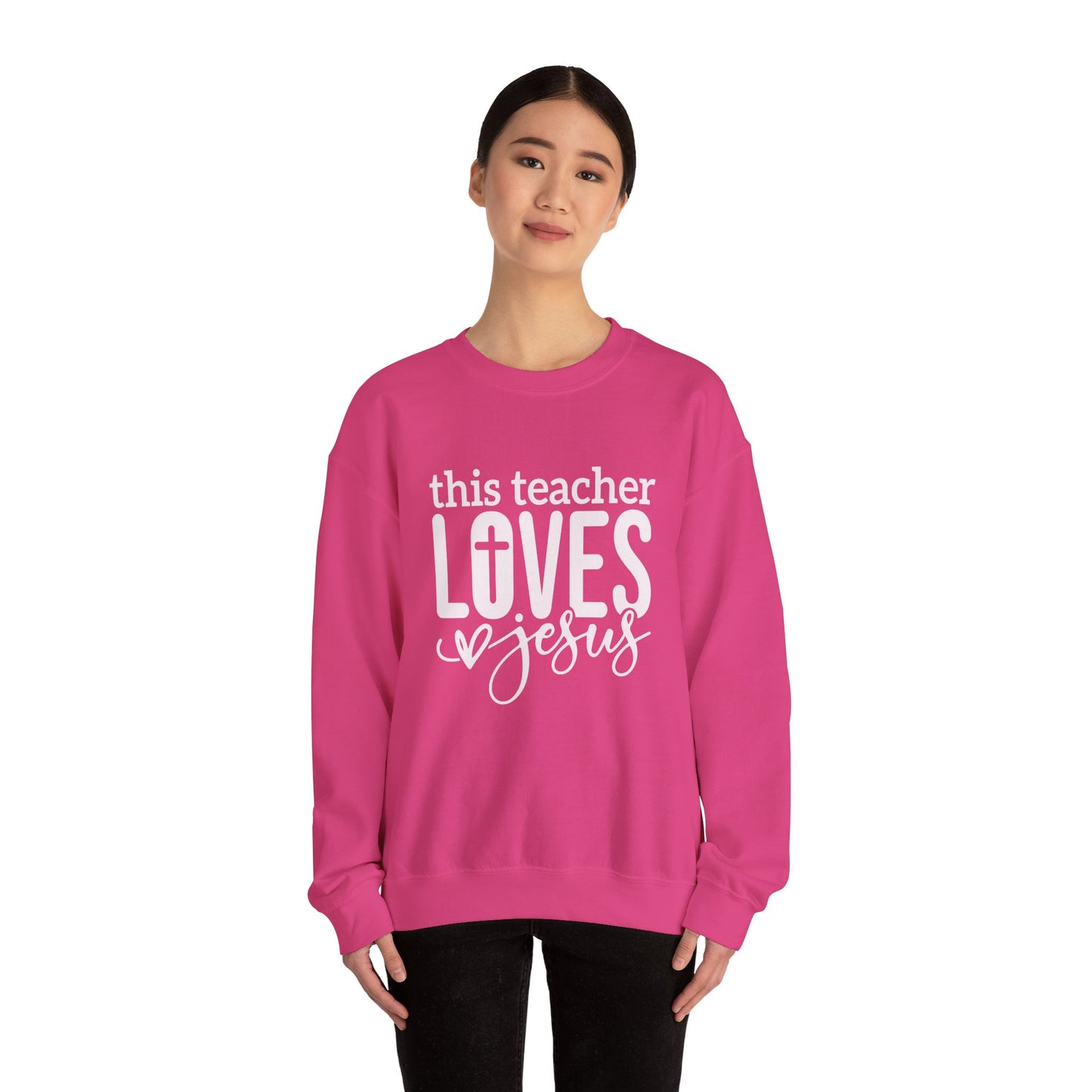 This Teacher Loves Jesus Unisex Heavy Blend™ Crewneck Christian Sweatshirt