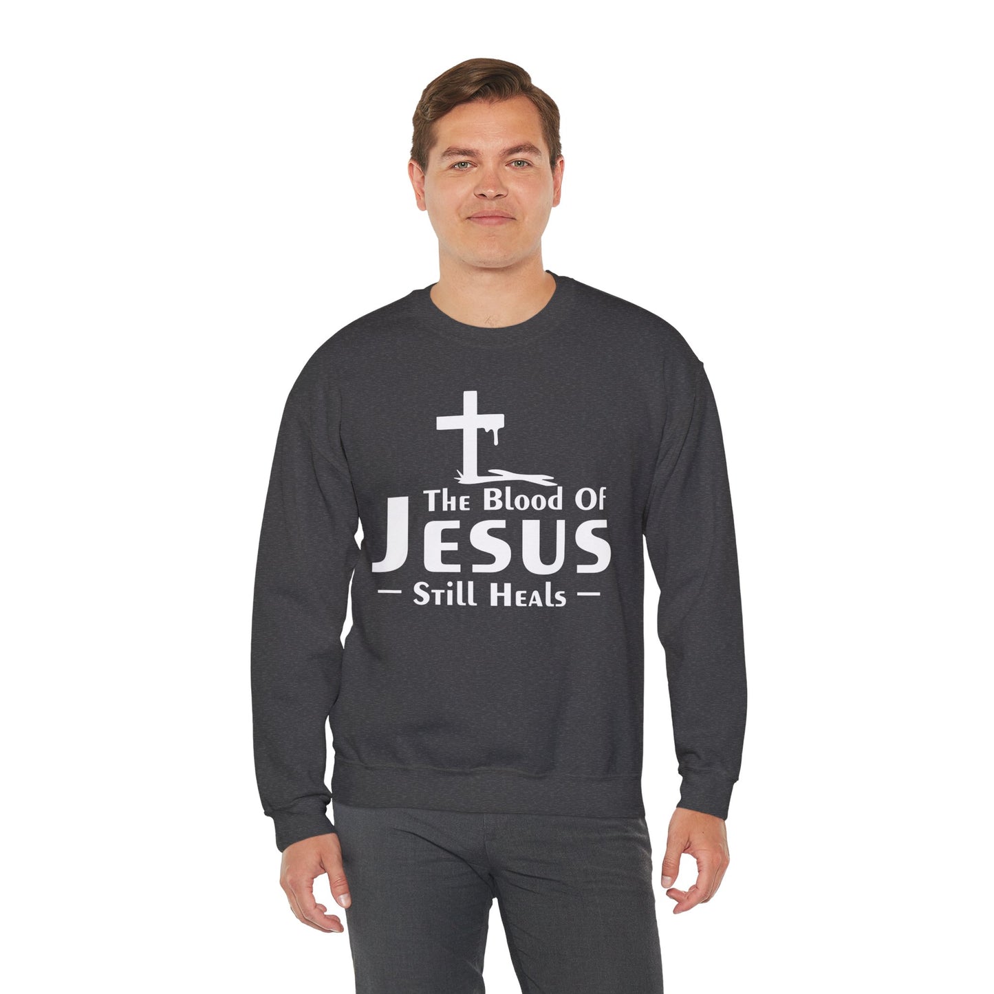 The Blood Of Jesus Still Heals Unisex Heavy Blend™ Crewneck Christian Sweatshirt