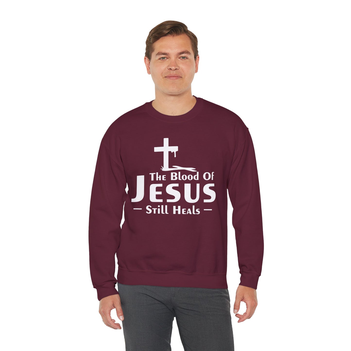 The Blood Of Jesus Still Heals Unisex Heavy Blend™ Crewneck Christian Sweatshirt