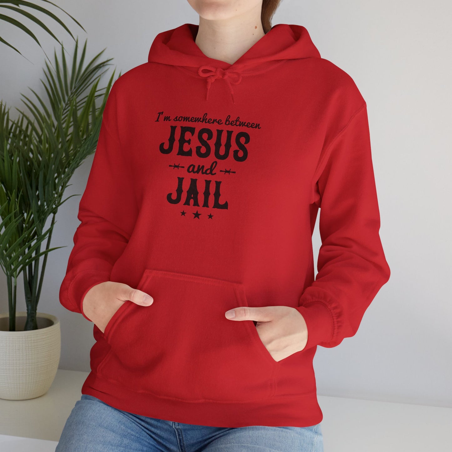 I'm Somewhere Between Jesus And Jail Funny Unisex Christian Hooded Pullover Sweatshirt