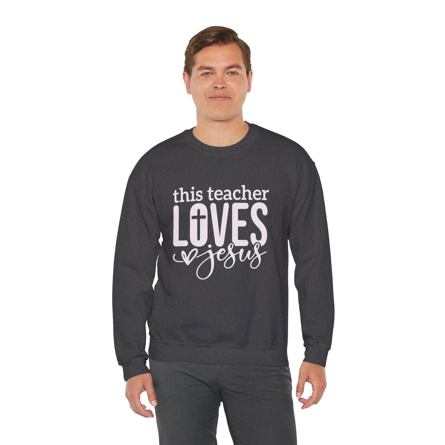 This Teacher Loves Jesus Unisex Heavy Blend™ Crewneck Christian Sweatshirt