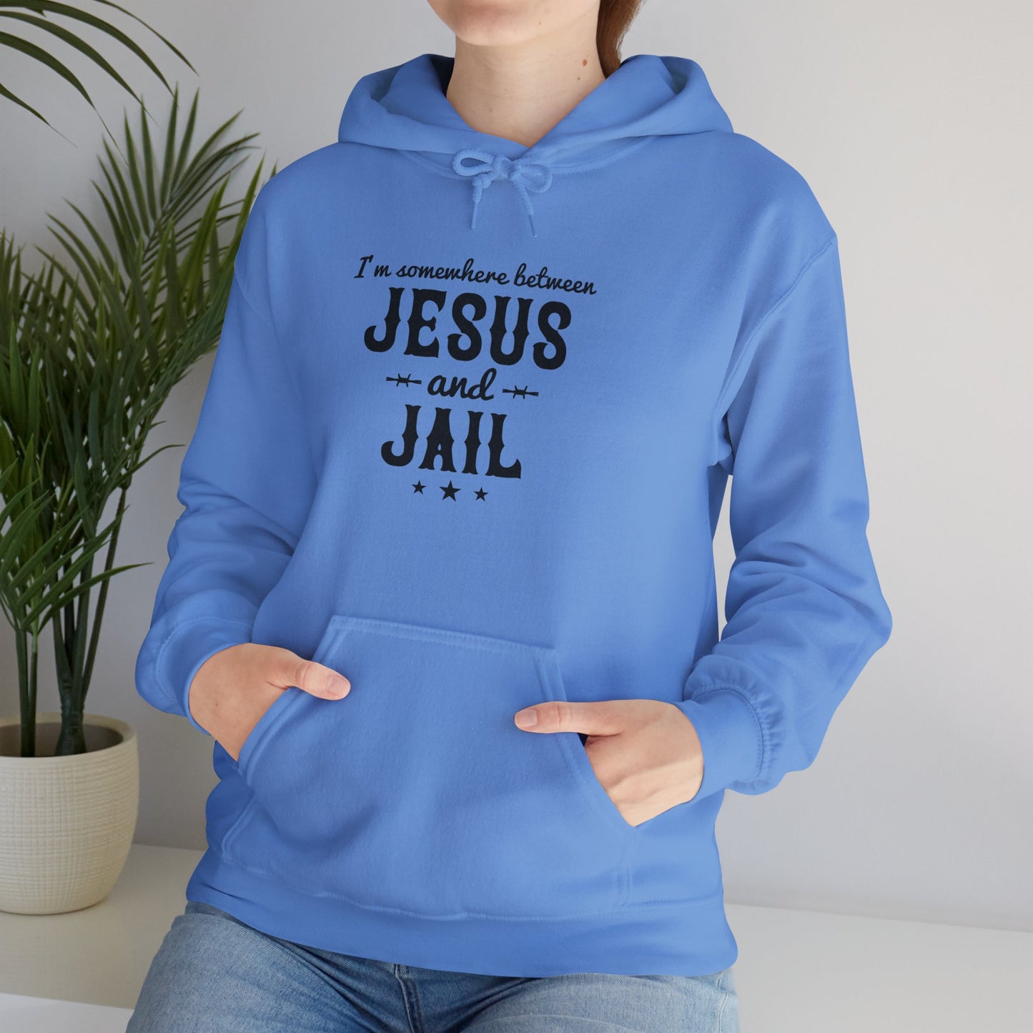 I'm Somewhere Between Jesus And Jail Funny Unisex Christian Hooded Pullover Sweatshirt