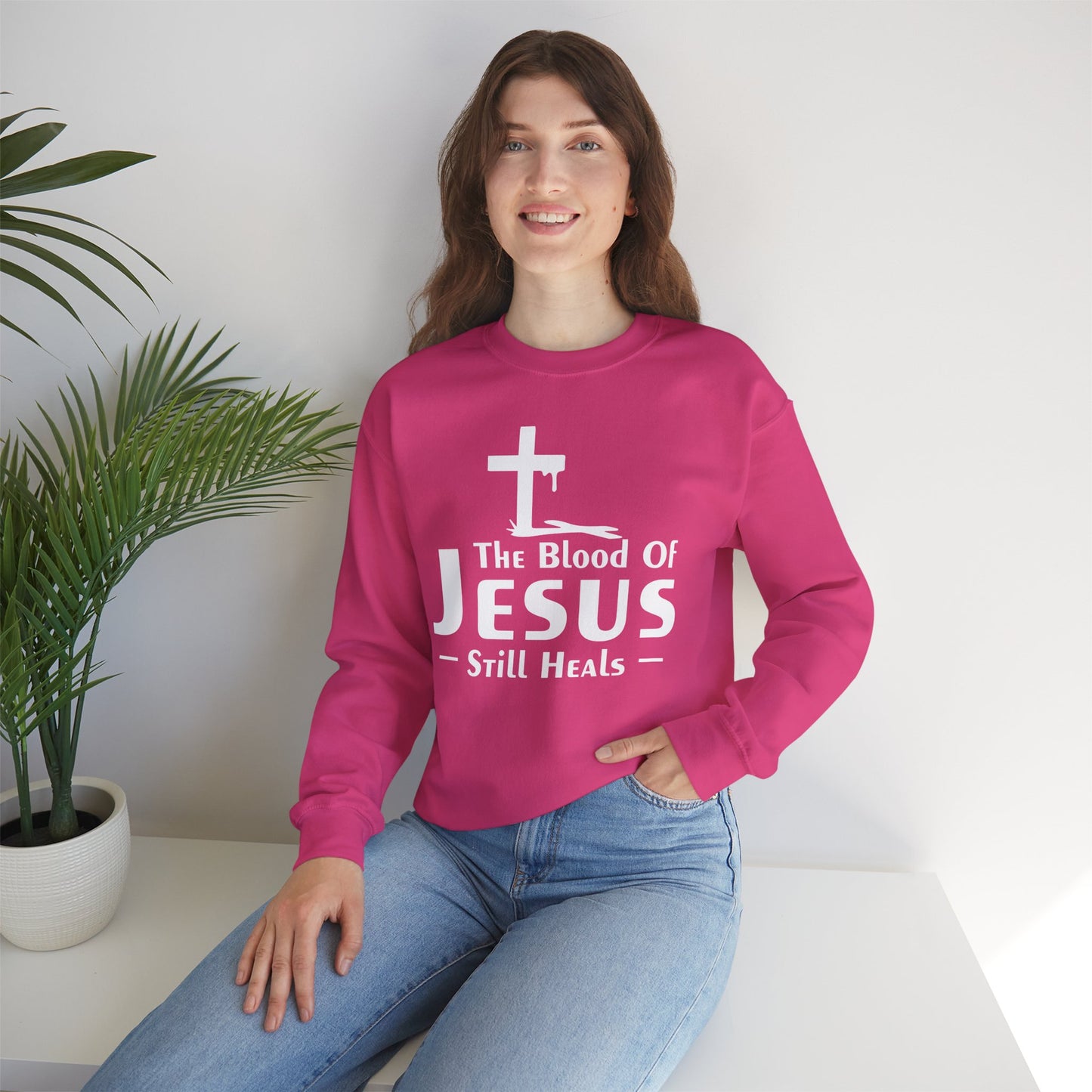 The Blood Of Jesus Still Heals Unisex Heavy Blend™ Crewneck Christian Sweatshirt