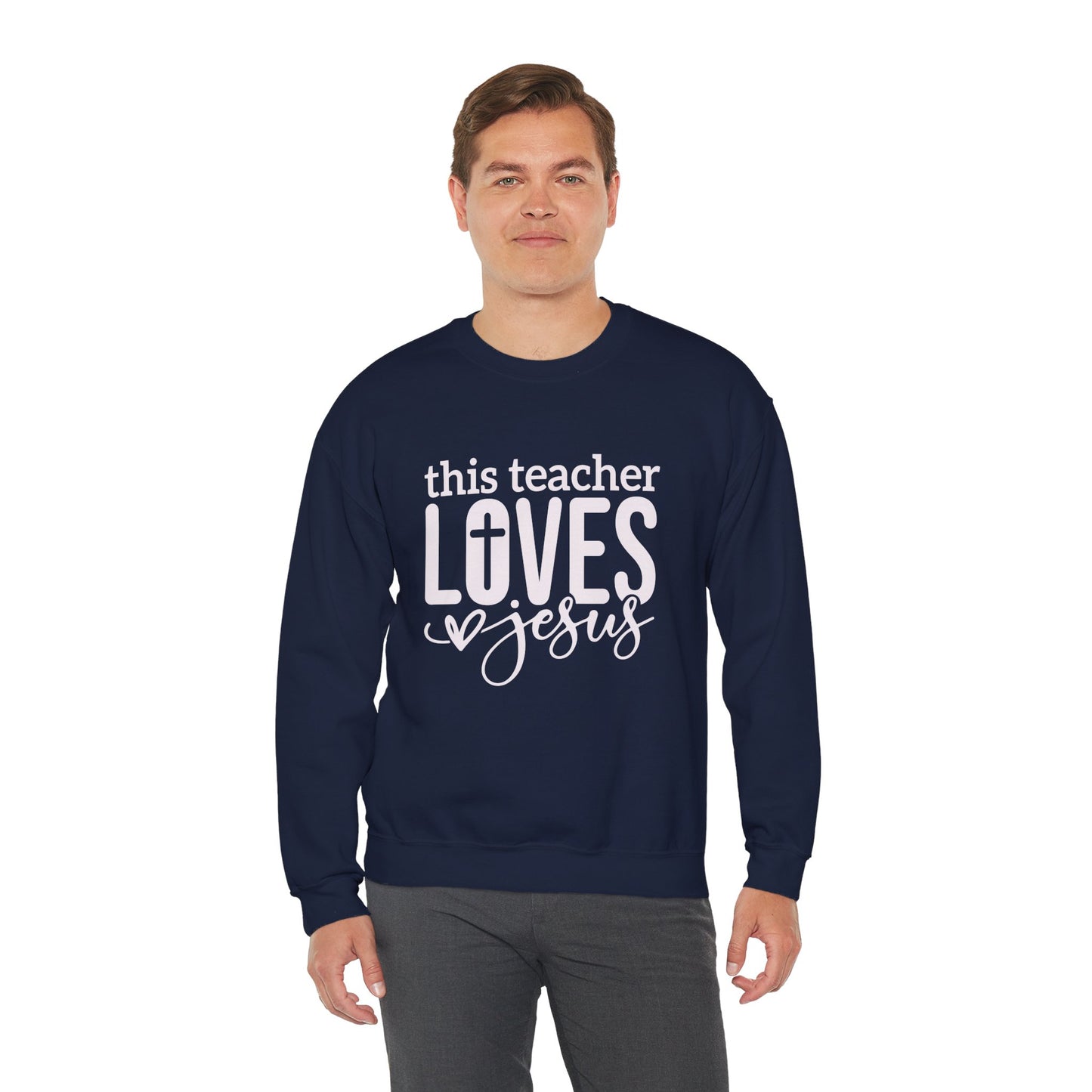 This Teacher Loves Jesus Unisex Heavy Blend™ Crewneck Christian Sweatshirt