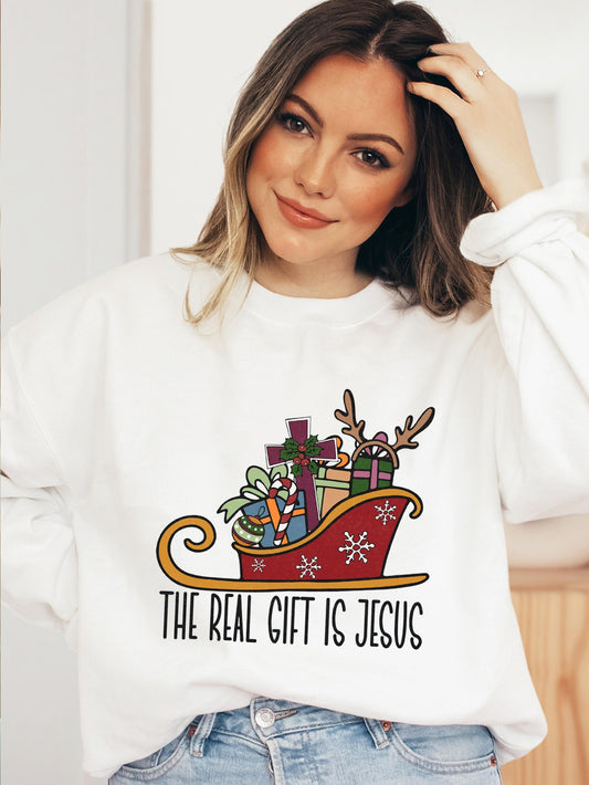 The Real Gift Of Christmas Is  Jesus Women's Christian Pullover Sweatshirt claimedbygoddesigns