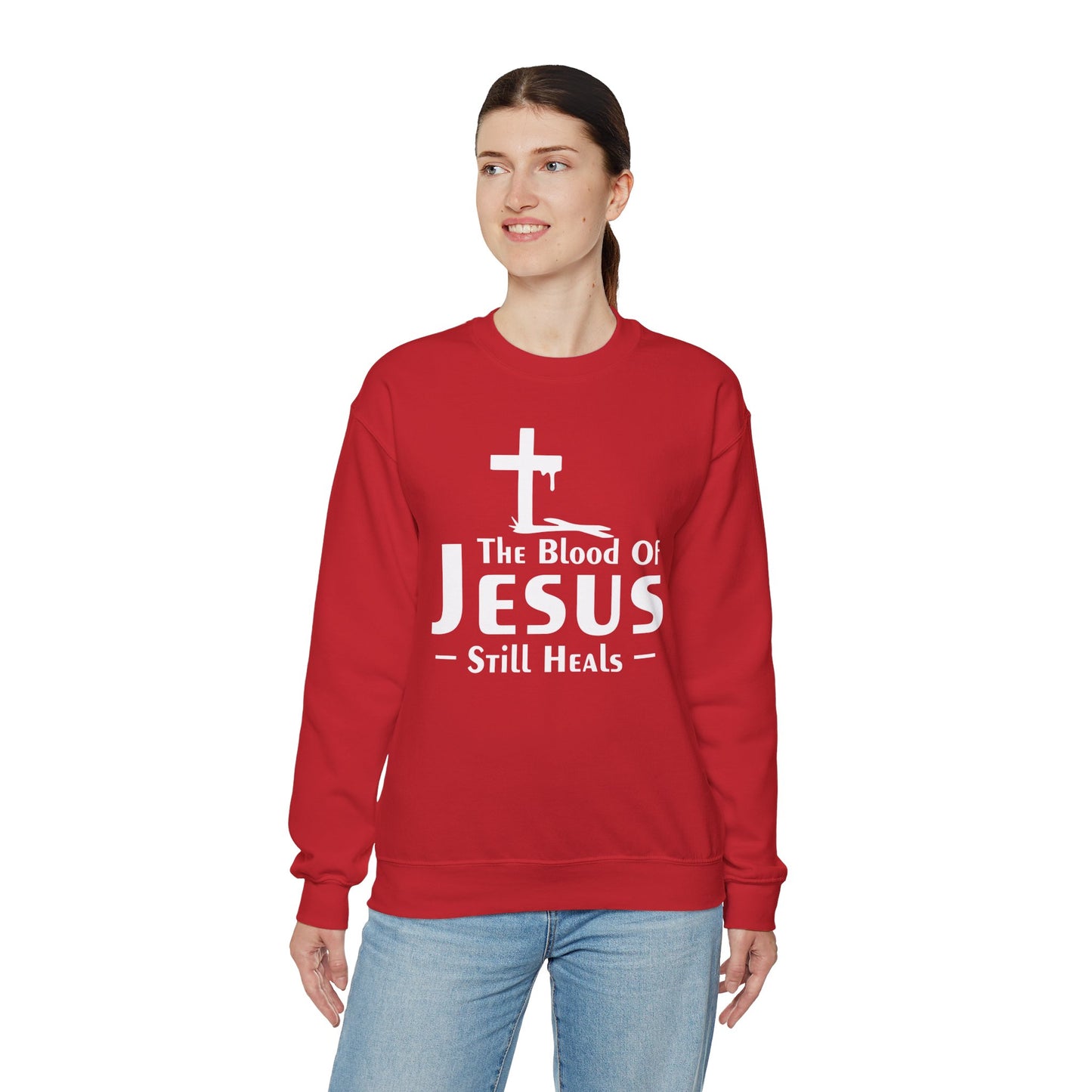 The Blood Of Jesus Still Heals Unisex Heavy Blend™ Crewneck Christian Sweatshirt