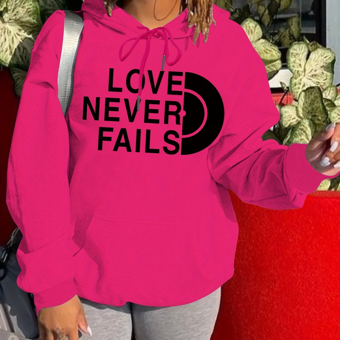 Love Never Fails Women's Christian Pullover Hooded Sweatshirt claimedbygoddesigns