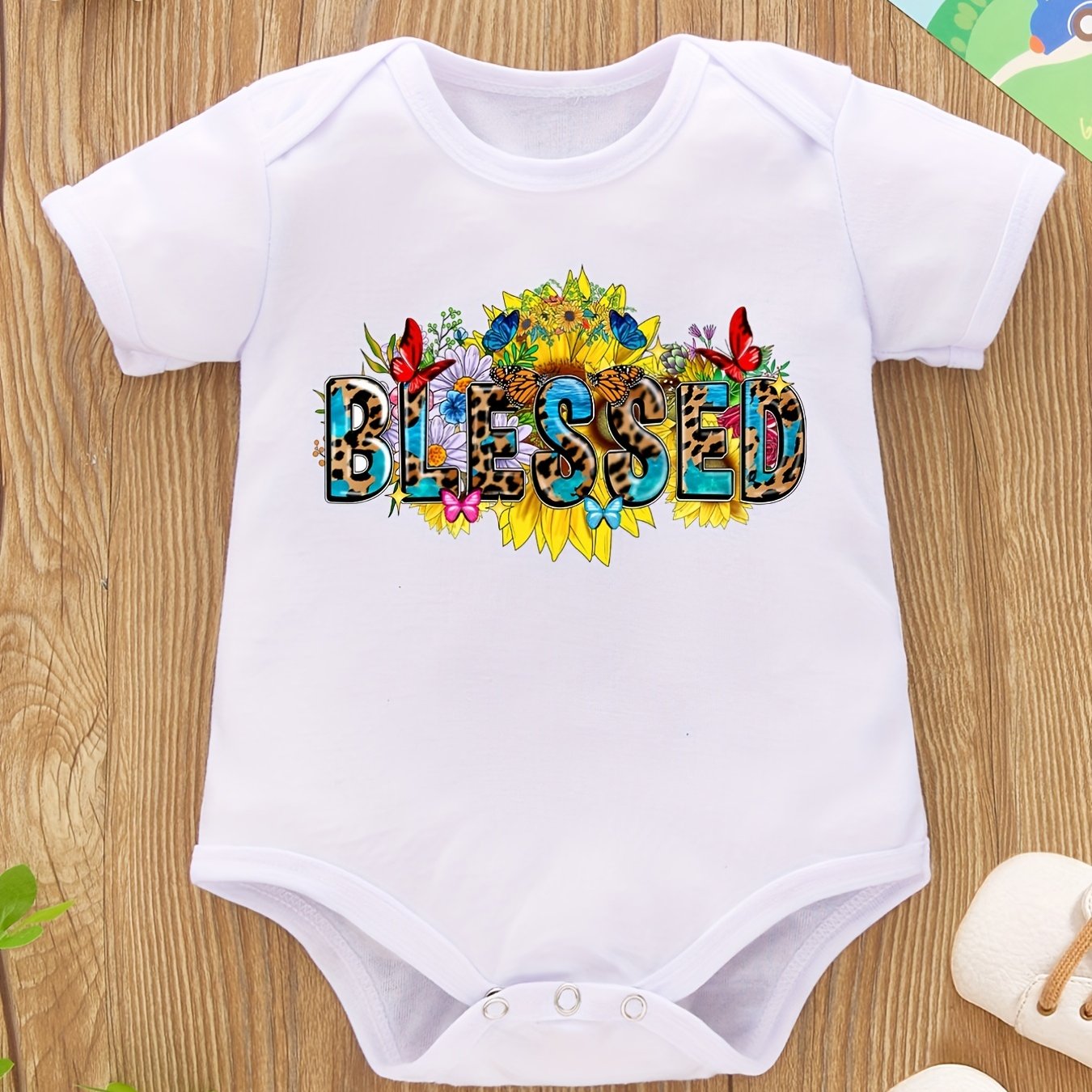 Blessed Christian Baby Onesie claimedbygoddesigns