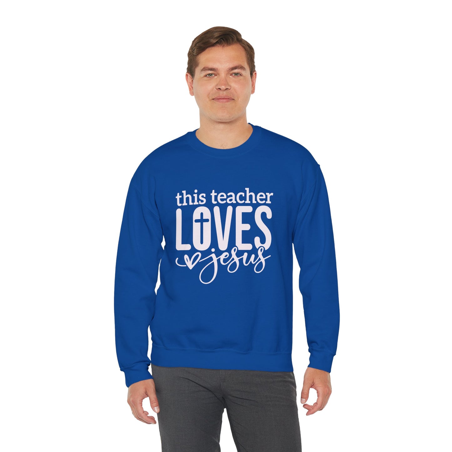 This Teacher Loves Jesus Unisex Heavy Blend™ Crewneck Christian Sweatshirt