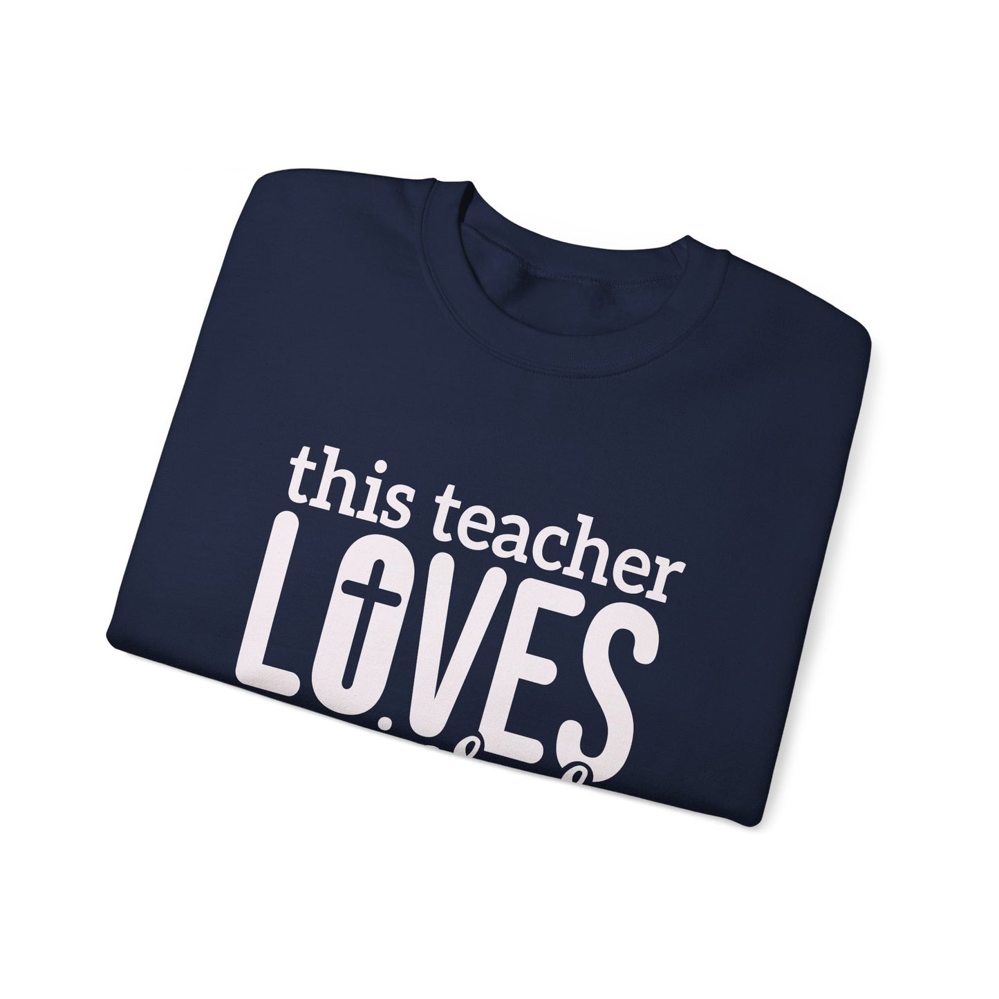 This Teacher Loves Jesus Unisex Heavy Blend™ Crewneck Christian Sweatshirt