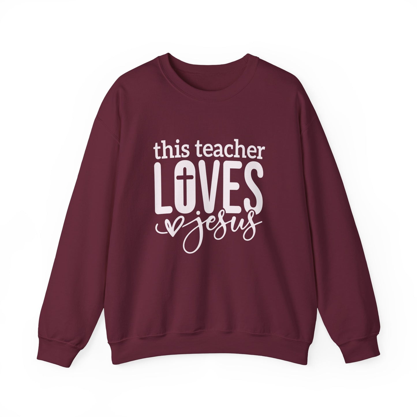 This Teacher Loves Jesus Unisex Heavy Blend™ Crewneck Christian Sweatshirt