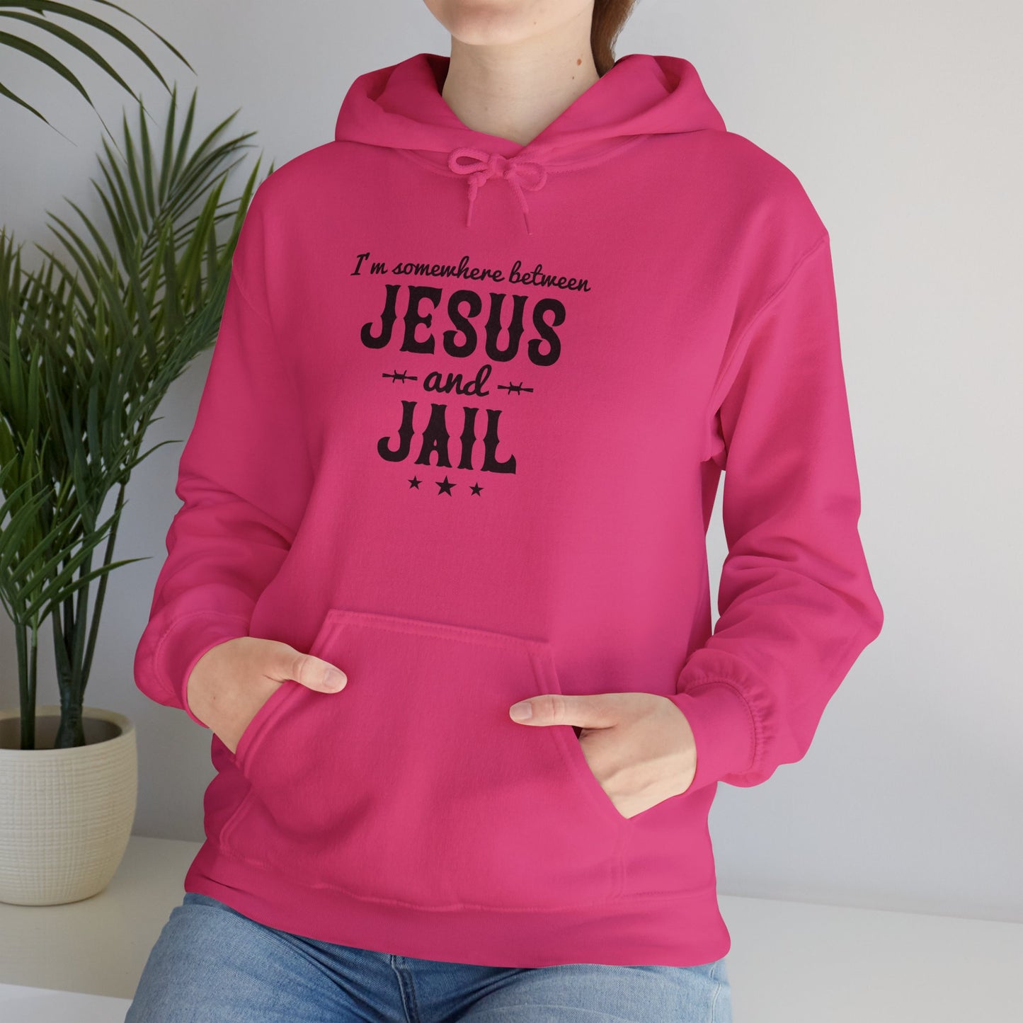 I'm Somewhere Between Jesus And Jail Funny Unisex Christian Hooded Pullover Sweatshirt