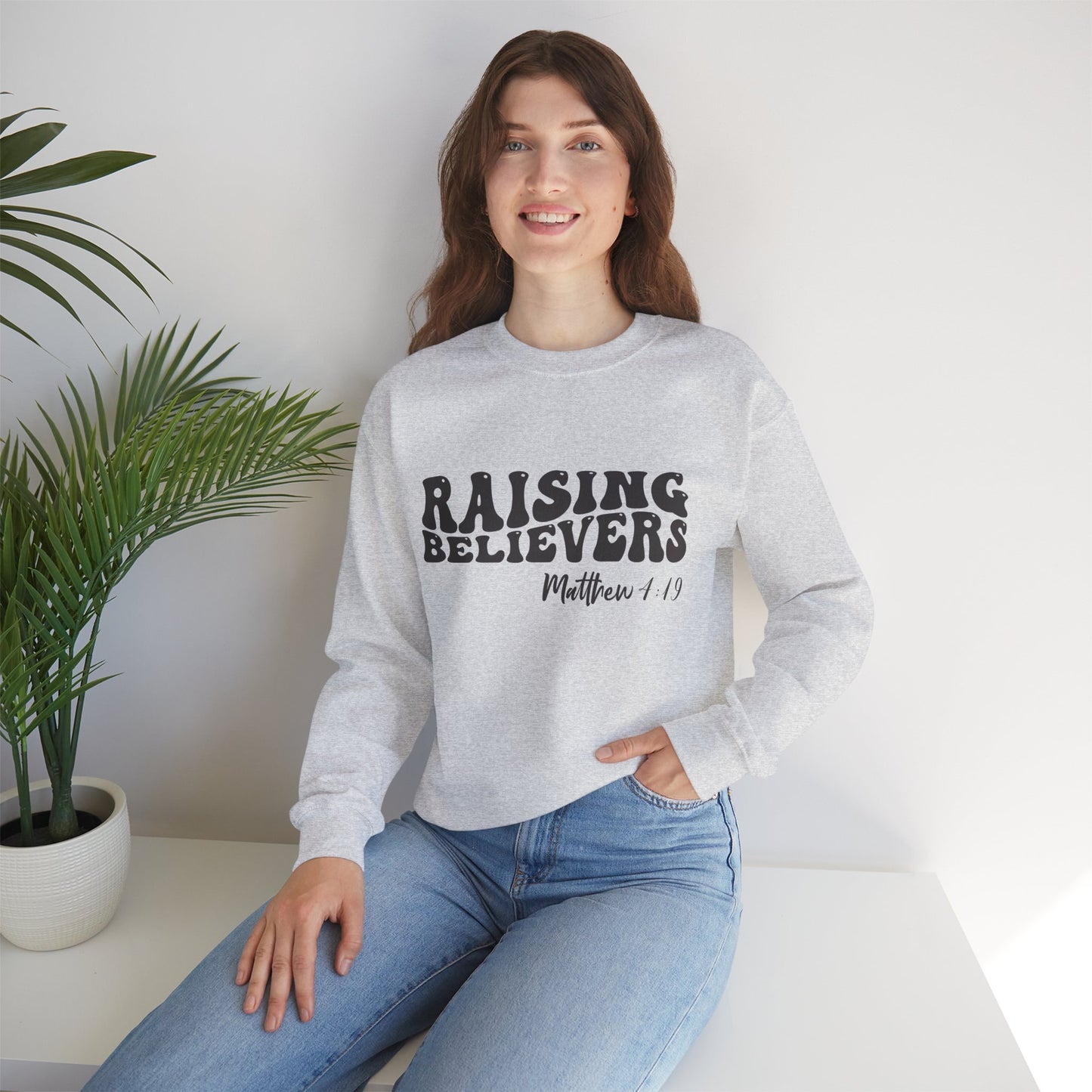 Raising Believers  Unisex Heavy Blend™ Crewneck Christian Sweatshirt