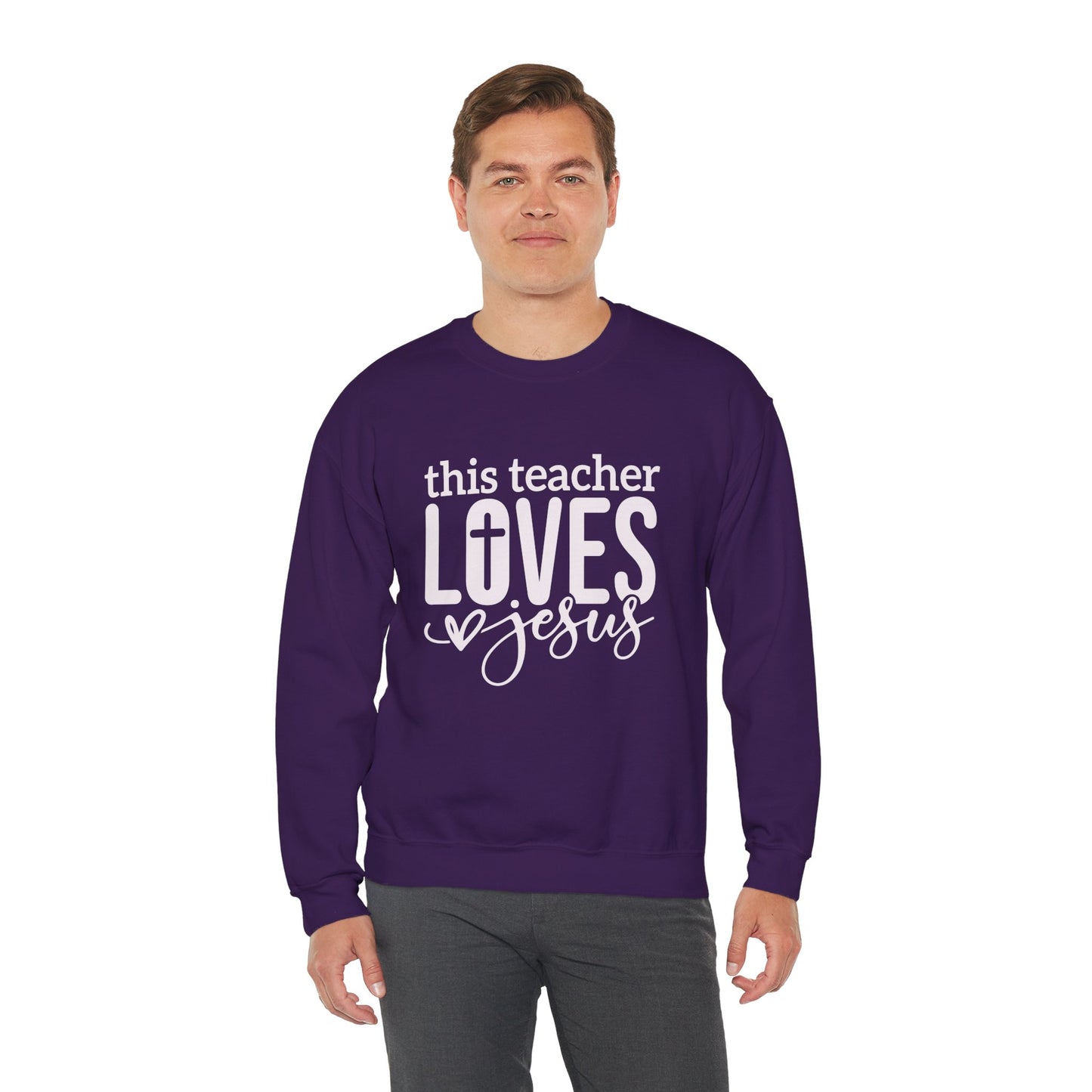 This Teacher Loves Jesus Unisex Heavy Blend™ Crewneck Christian Sweatshirt