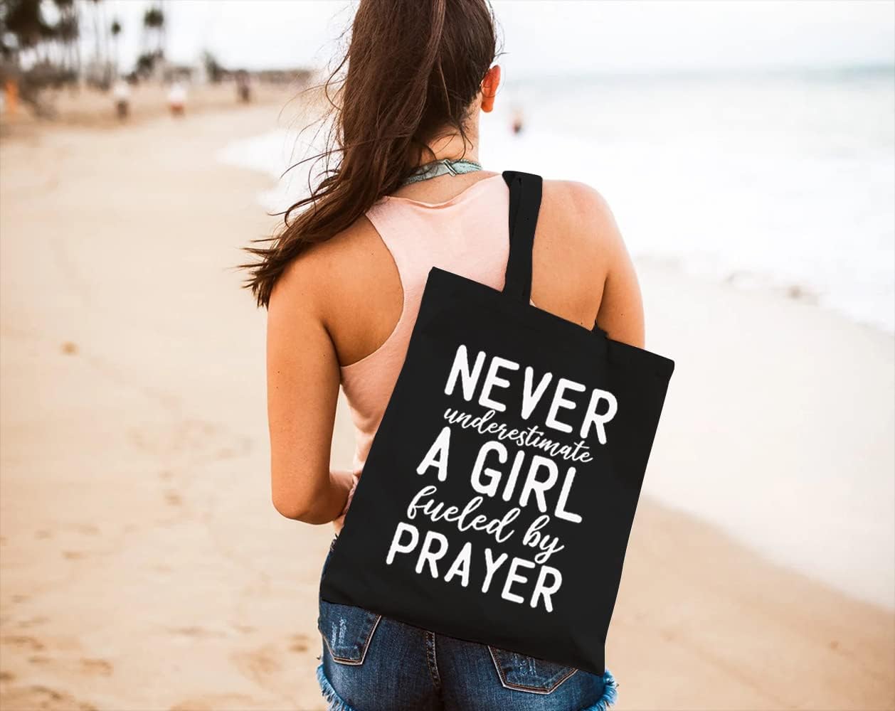 Never Underestimate A Girl Fueled By Prayer Christian Tote Bag claimedbygoddesigns