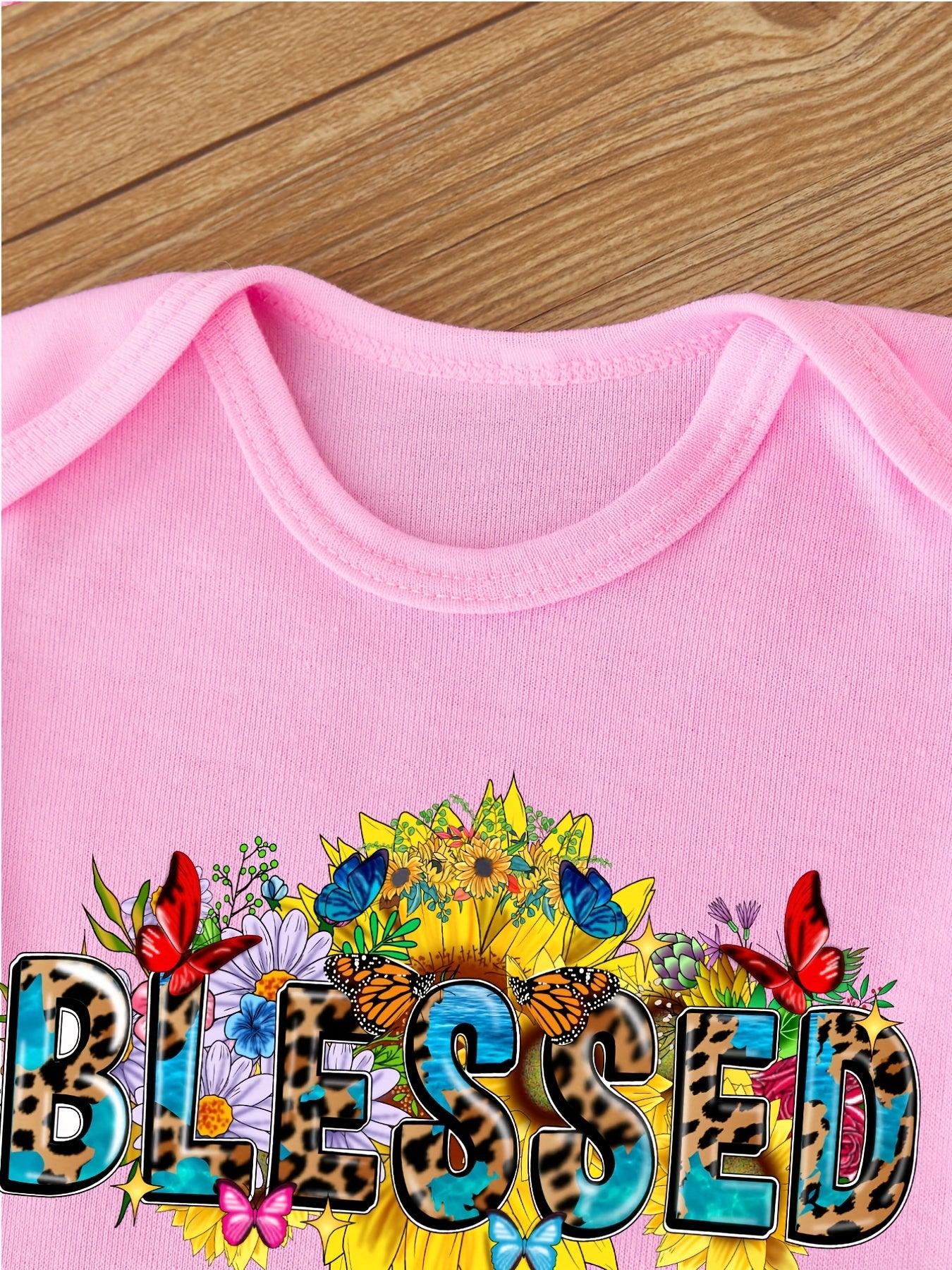 Blessed Christian Baby Onesie claimedbygoddesigns