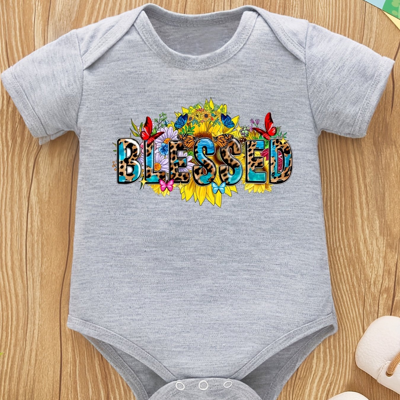 Blessed Christian Baby Onesie claimedbygoddesigns