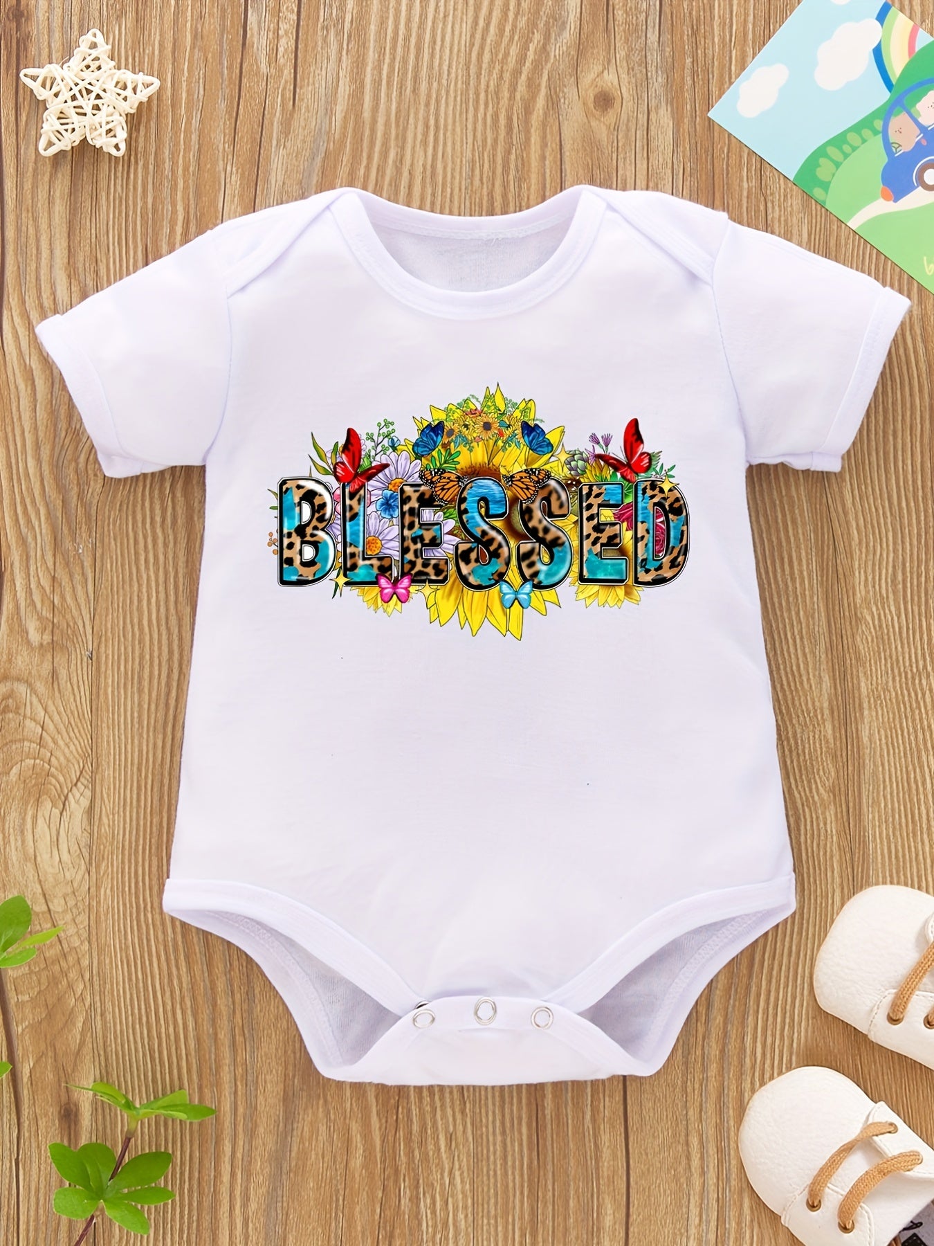 Blessed Christian Baby Onesie claimedbygoddesigns