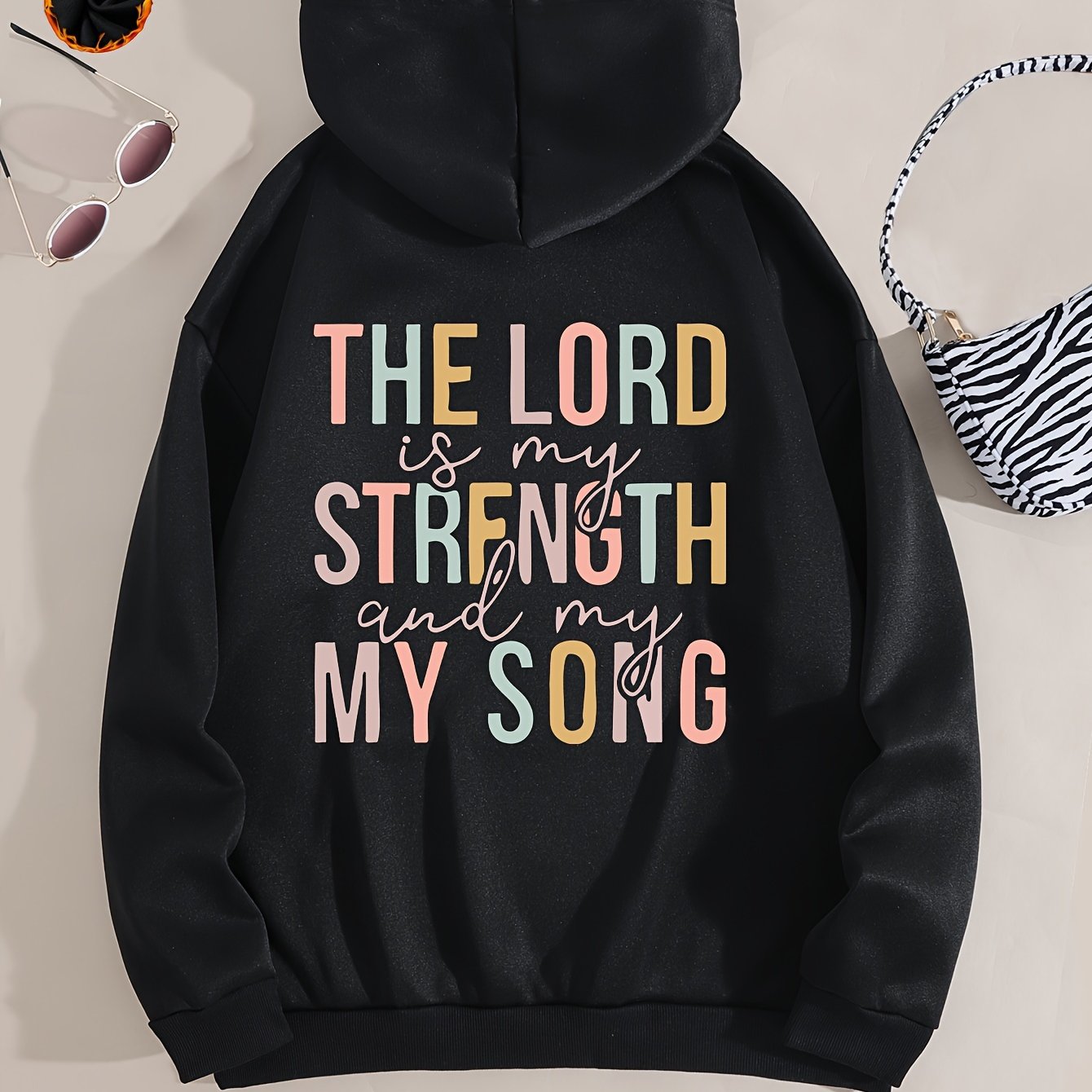 The Lord Is My Strength And My Song Women's Christian Pullover Hooded Sweatshirt claimedbygoddesigns