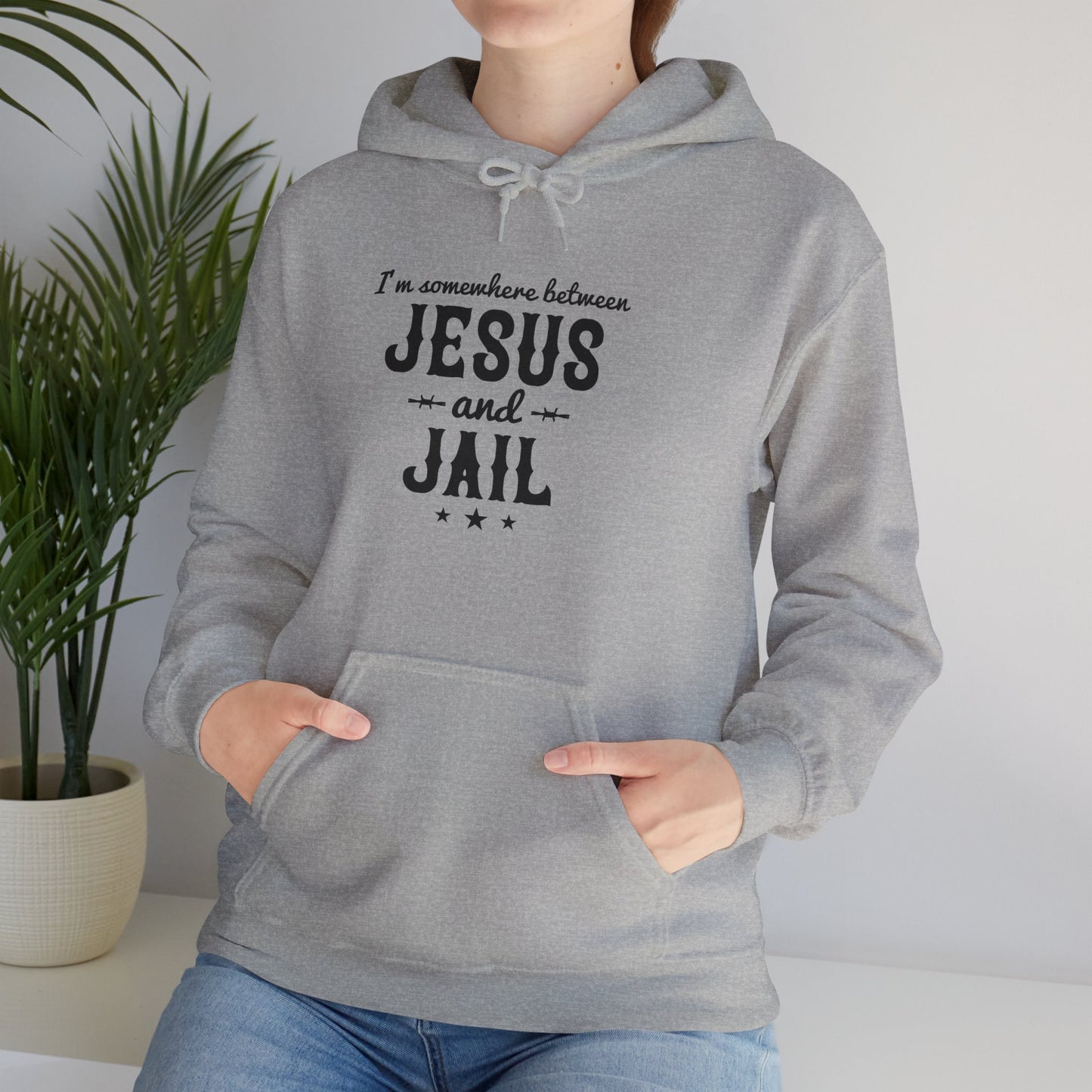 I'm Somewhere Between Jesus And Jail Funny Unisex Christian Hooded Pullover Sweatshirt