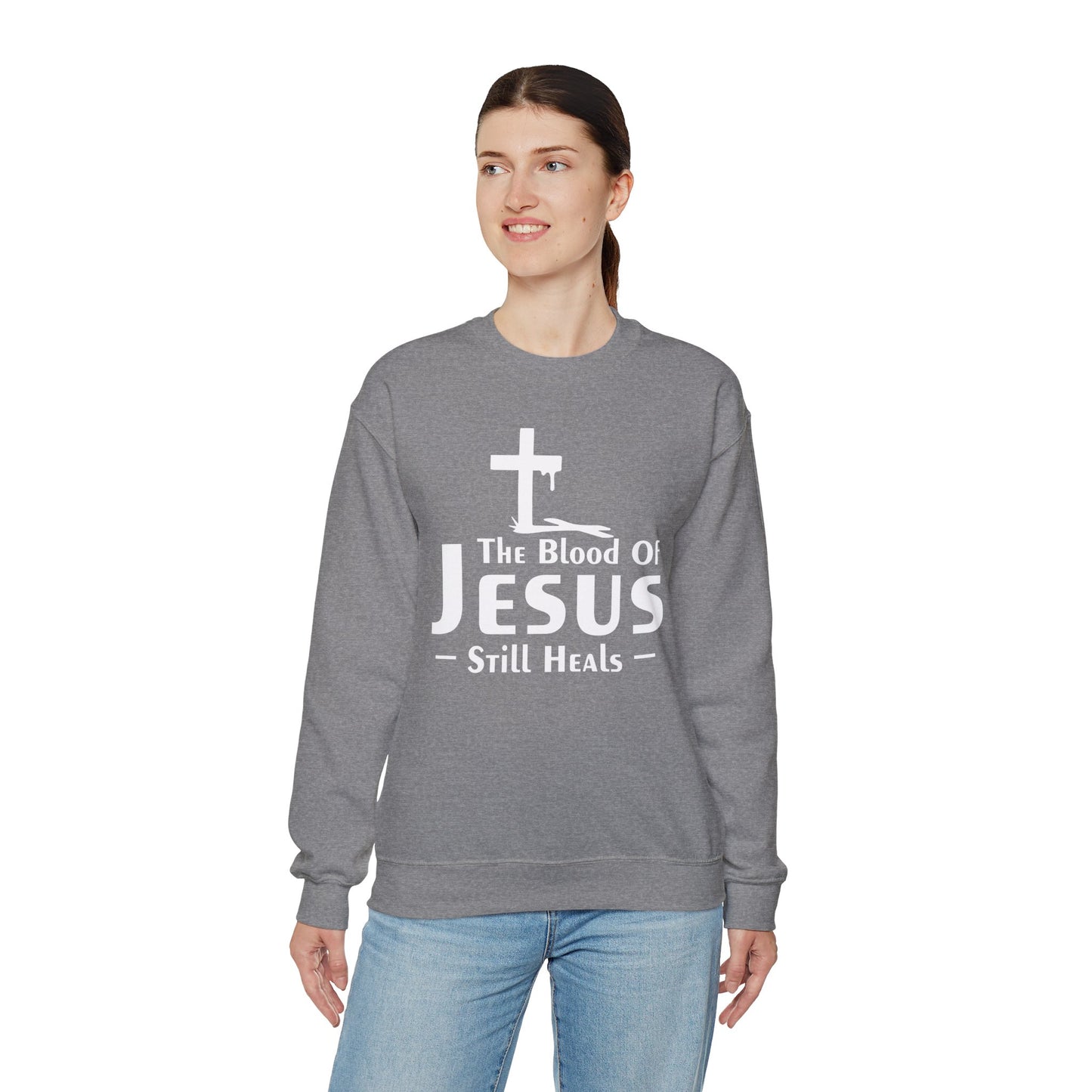 The Blood Of Jesus Still Heals Unisex Heavy Blend™ Crewneck Christian Sweatshirt