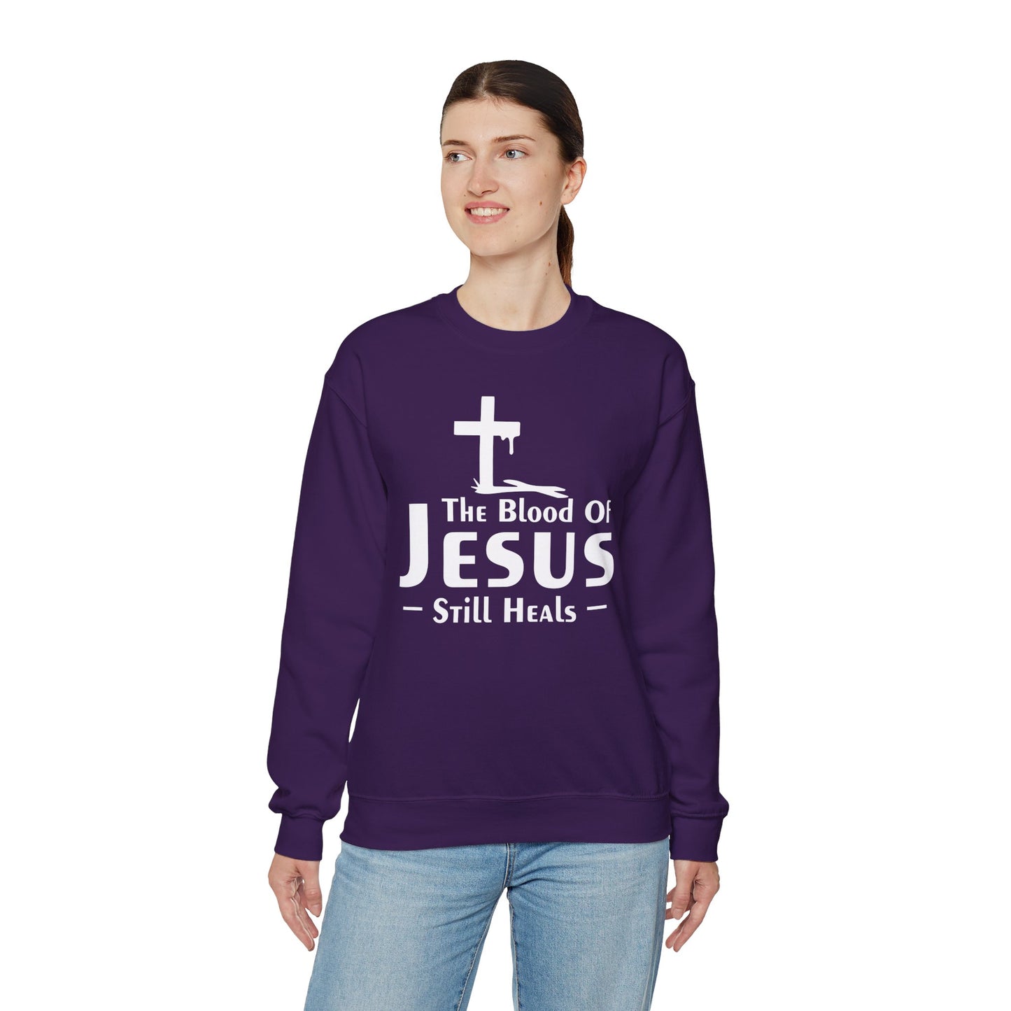 The Blood Of Jesus Still Heals Unisex Heavy Blend™ Crewneck Christian Sweatshirt