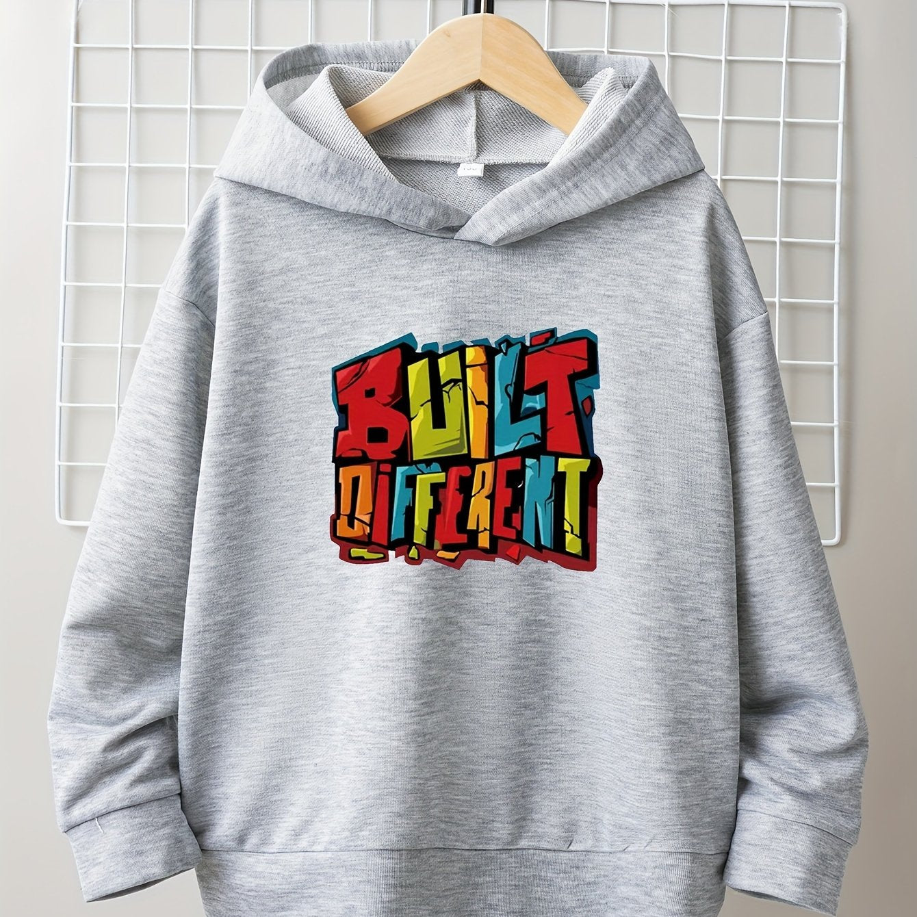 BUILT DIFFERENT Youth Christian Pullover Hooded Sweatshirt claimedbygoddesigns