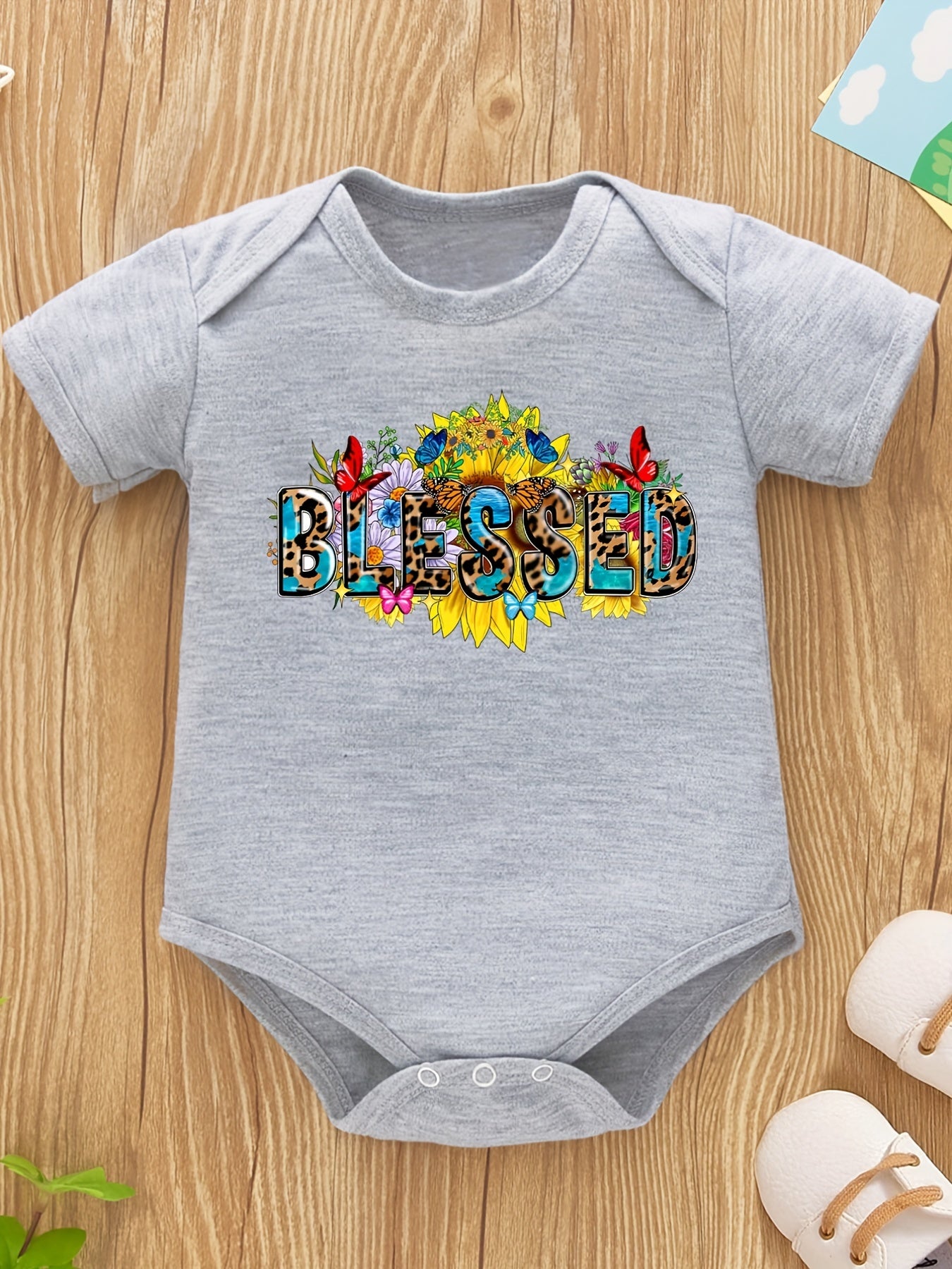 Blessed Christian Baby Onesie claimedbygoddesigns