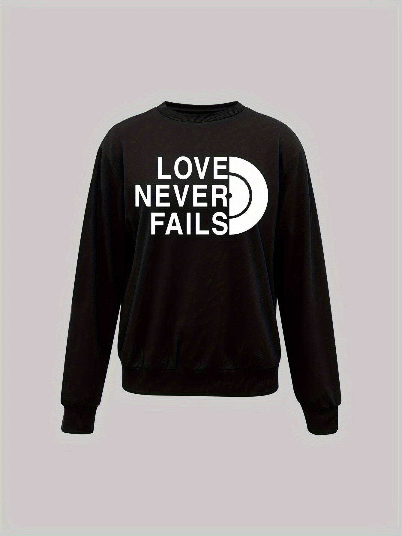 Love Never Fails Women's Christian Pullover Sweatshirt claimedbygoddesigns