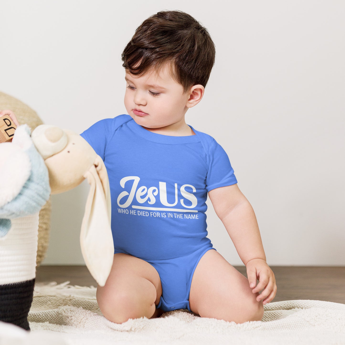 JesUS Who He Died For Is In The Name Christian Baby short sleeve onesie