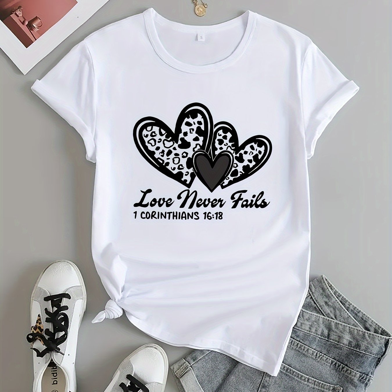 Love Never Fails Women's Christian T-shirt claimedbygoddesigns