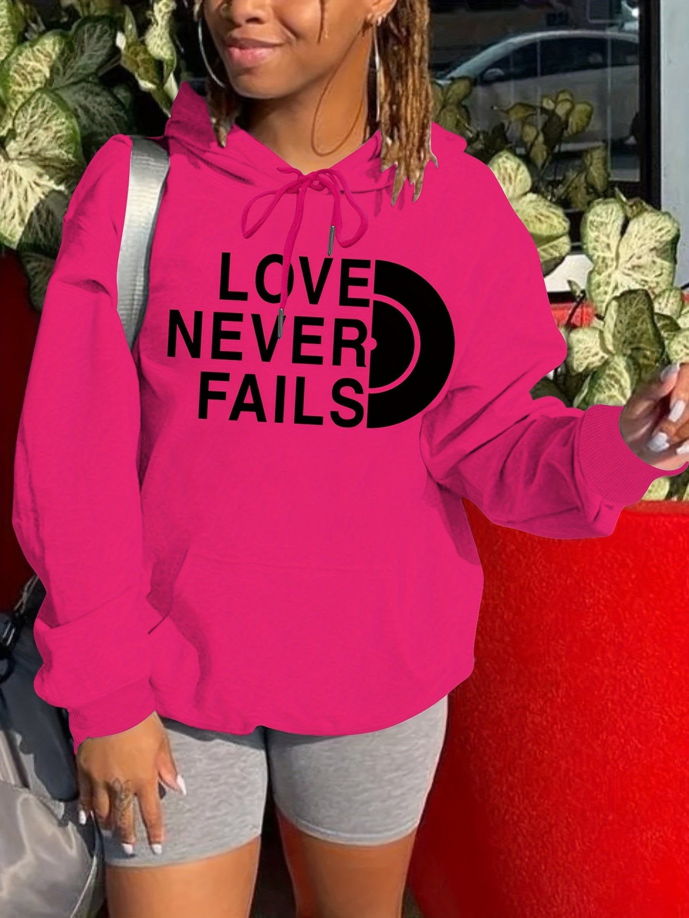 Love Never Fails Women's Christian Pullover Hooded Sweatshirt claimedbygoddesigns