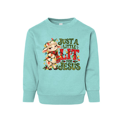 Just A Little Lit For Jesus toddler Christmas sweatshirt with a lamb wrapped in Christmas lights, front