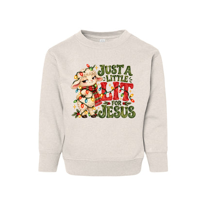 Just A Little Lit For Jesus toddler Christmas sweatshirt with a lamb wrapped in Christmas lights, front