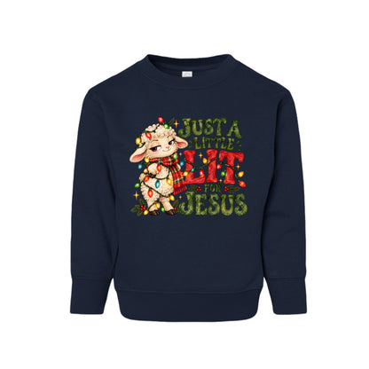 Just A Little Lit For Jesus toddler Christmas sweatshirt with a lamb wrapped in Christmas lights, front