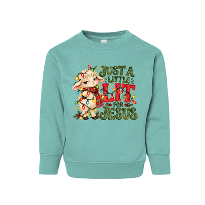 Just A Little Lit For Jesus toddler Christmas sweatshirt with a lamb wrapped in Christmas lights, front